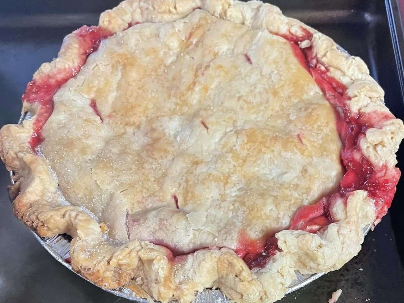 Curt Thacker of Thacker Insurance Service offered Apple and Cherry pies for auction on WGEL.