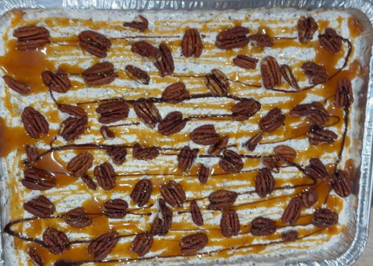 Sheriff Josh Hill and Unit 2 School Resource Officer Taylor Hill joined WGEL on Thursday. Josh's wife baked this incredible Caramel Turtle Pecan Cheesecake. Powder Plus, in memory of Jason Sugg, made the highest bid and won it.